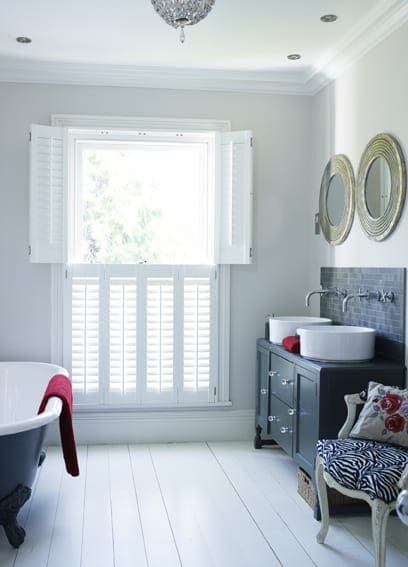White shutters in white room