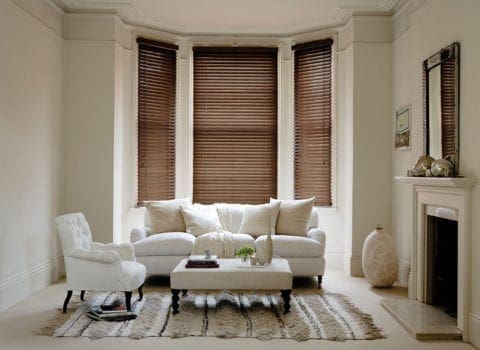Bay window with wooden blinds