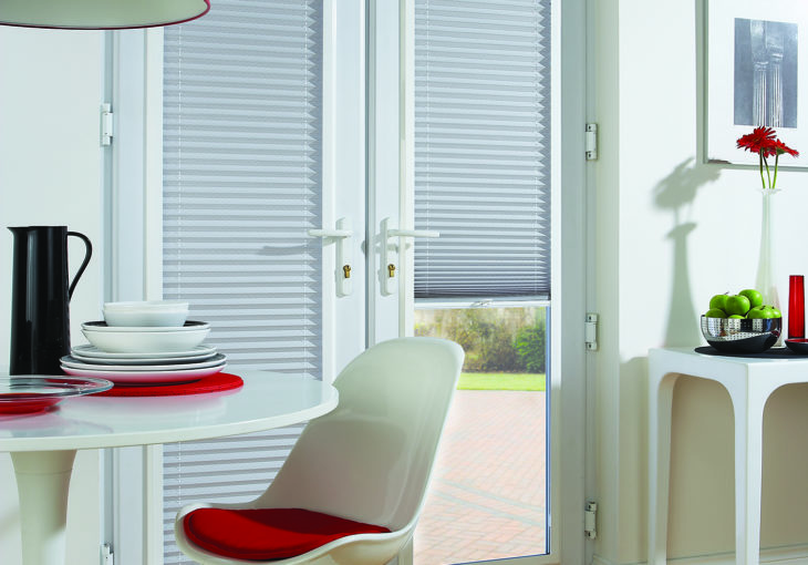 Pleated Madrid Chrome perfect fit blinds in a dining room