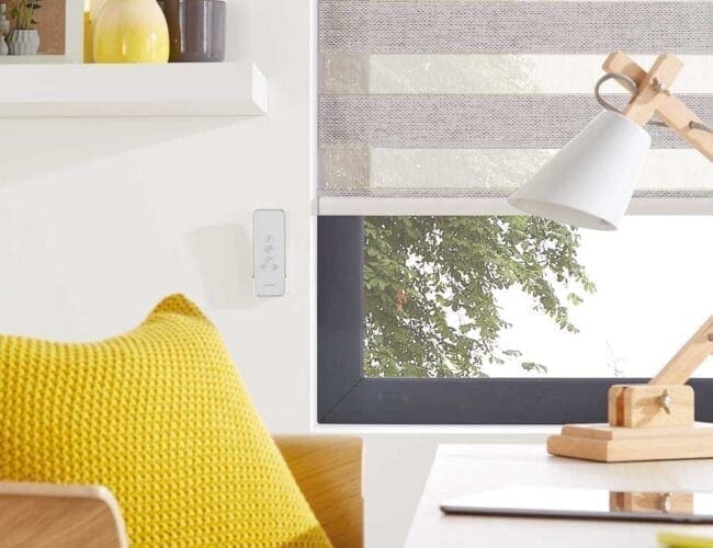 brown woven chairs with yellow cushions in a well lit room