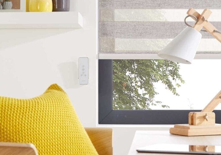 brown woven chairs with yellow cushions in a well lit room