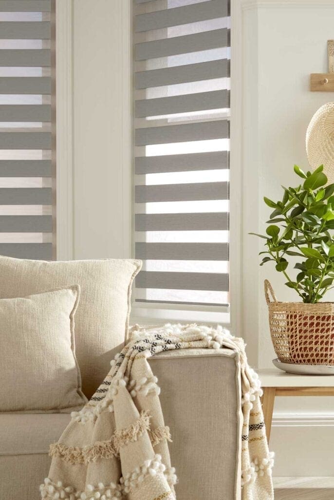Grey Day and Night blinds in a bright and modern living room