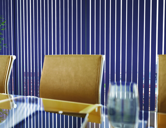Grey vertical blinds in a meeting room