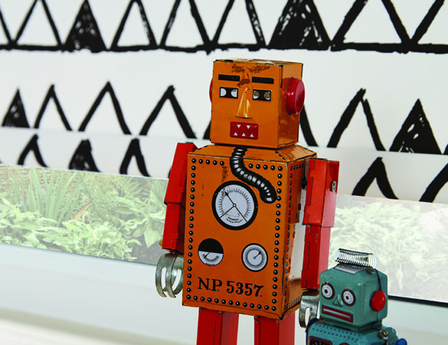 Sketch Noir roller blinds in a family room