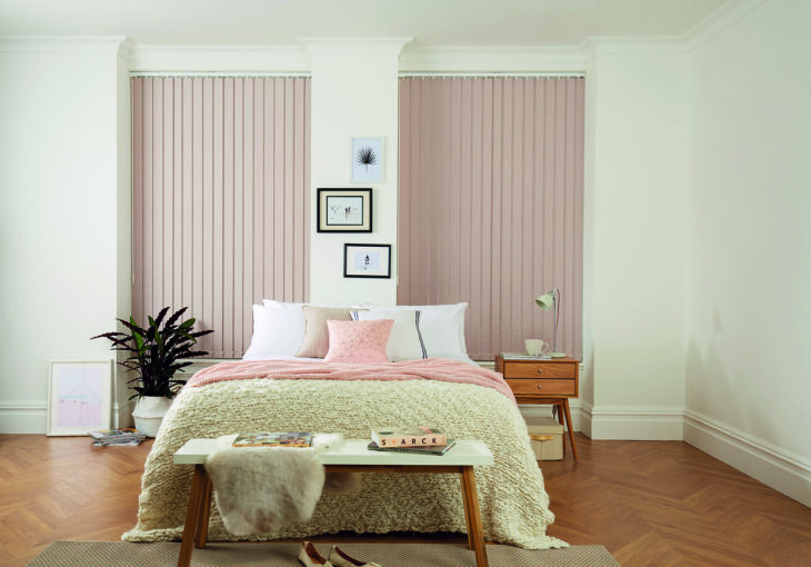 Bedroom with vertical blinds