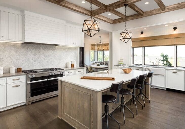 a kitchen with blinds fitted above the windows