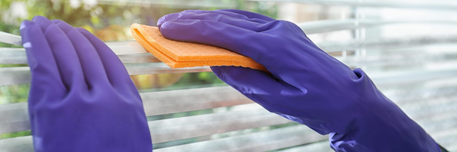 hands-in-rubber-gloves-cleaning-blinds