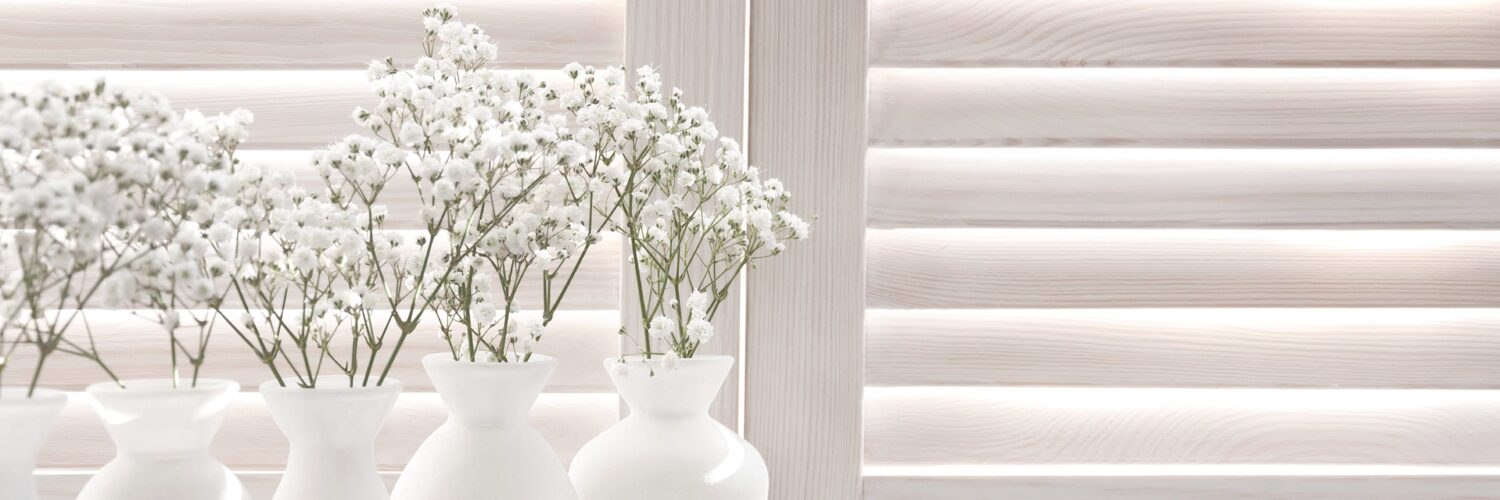white-shutters-with-vases