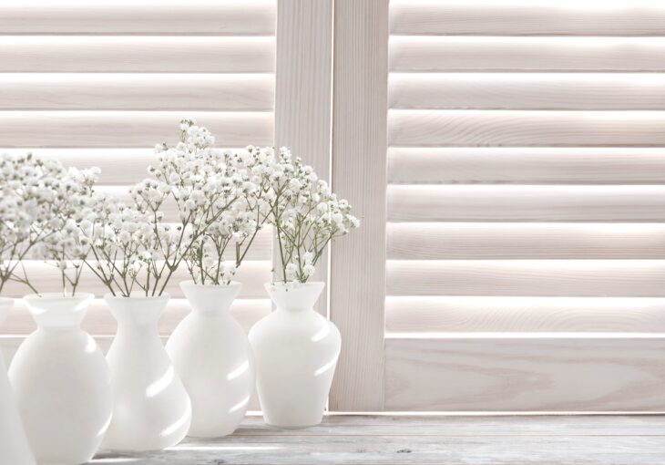 white-shutters-with-vases