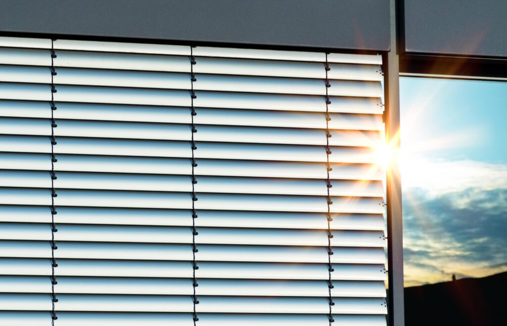 venetian-blinds-letting-light-through