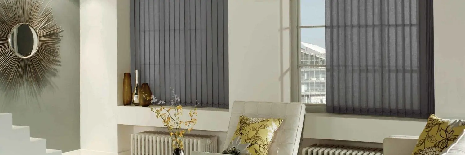 Black vertical blinds in modern living room with natural light