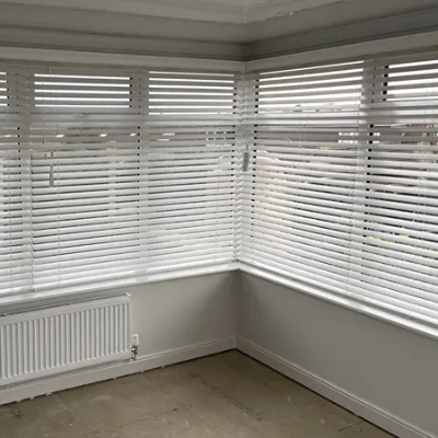 Venetian blinds in conservatory providing light and temperature control